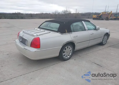 2004 Lincoln Town Car Ultimate из США, поврежденный, VIN 1LNHM83W34Y650904
